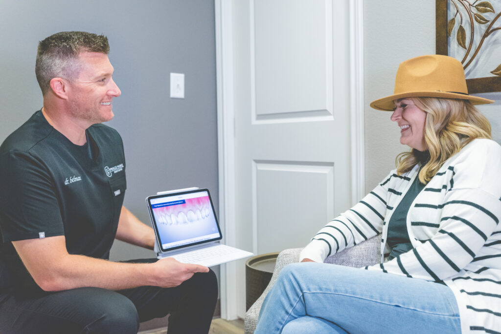 Dr. Belman discussing treatment plan with patient at Frisco Family Dentistry