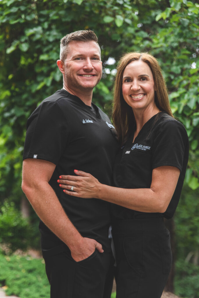 Warm smiles from our Frisco dentist, Dr. Belman, and his wife.